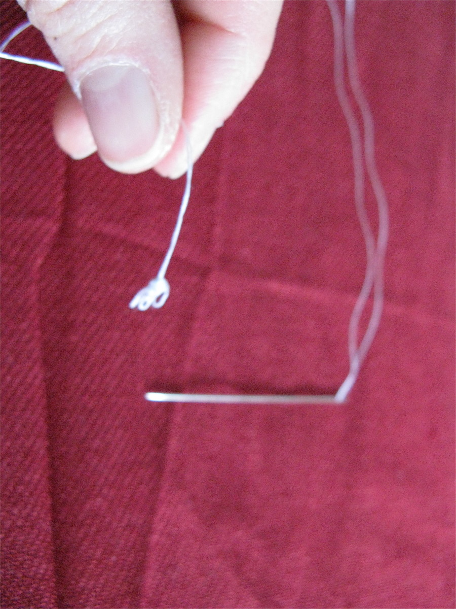 The final result: a thick knot that won't pull through your fabric.