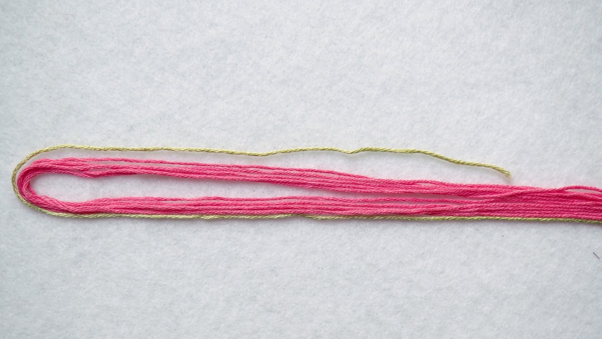 Join the floss together before making the knot.