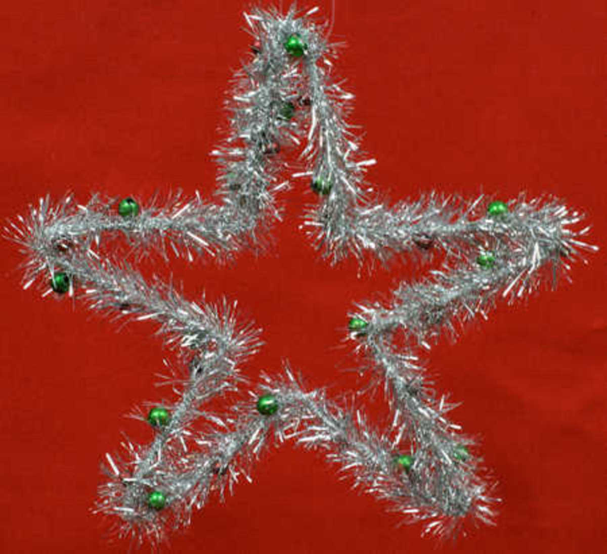 You can always form your tinsel into recognizable shapes like that of a star or a tree.