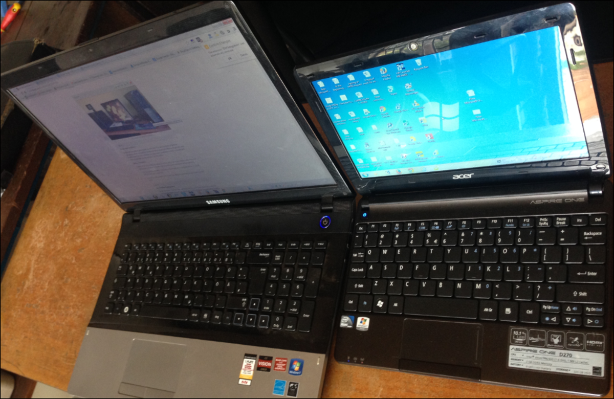 A 17 inch laptop and 10 inch netbook side by side.