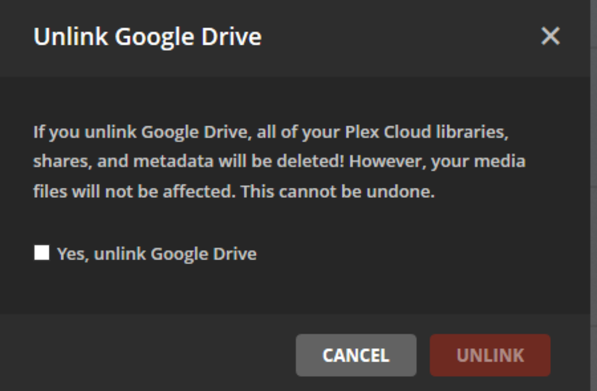 You must click to place a check mark next to the "Yes, unlink Google Drive" before you can click Unlink.