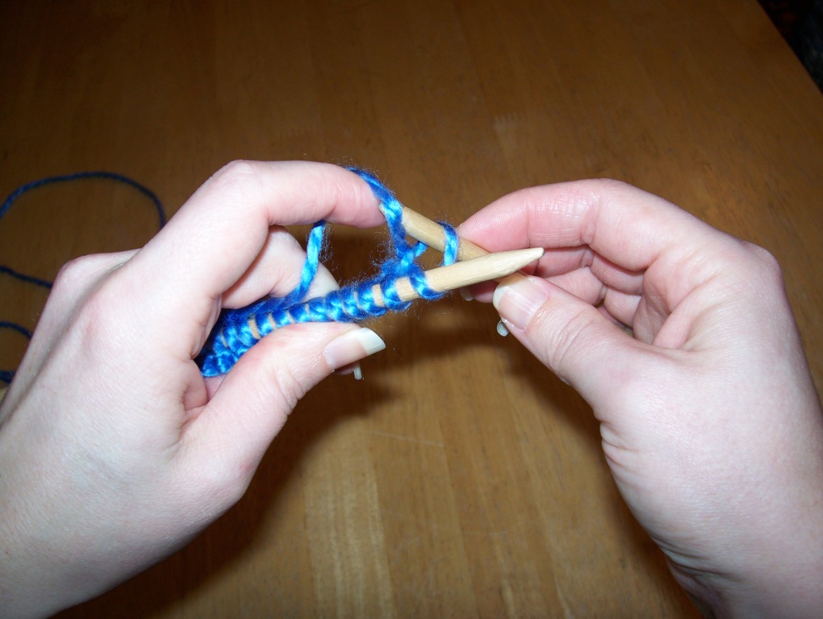 Bring the loose yarn under and over the needle.