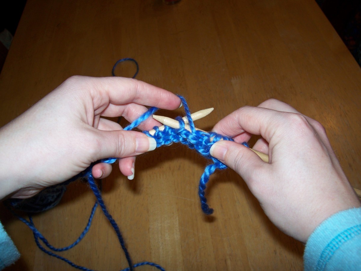 Bring loose yarn over the right needle, from right to left.