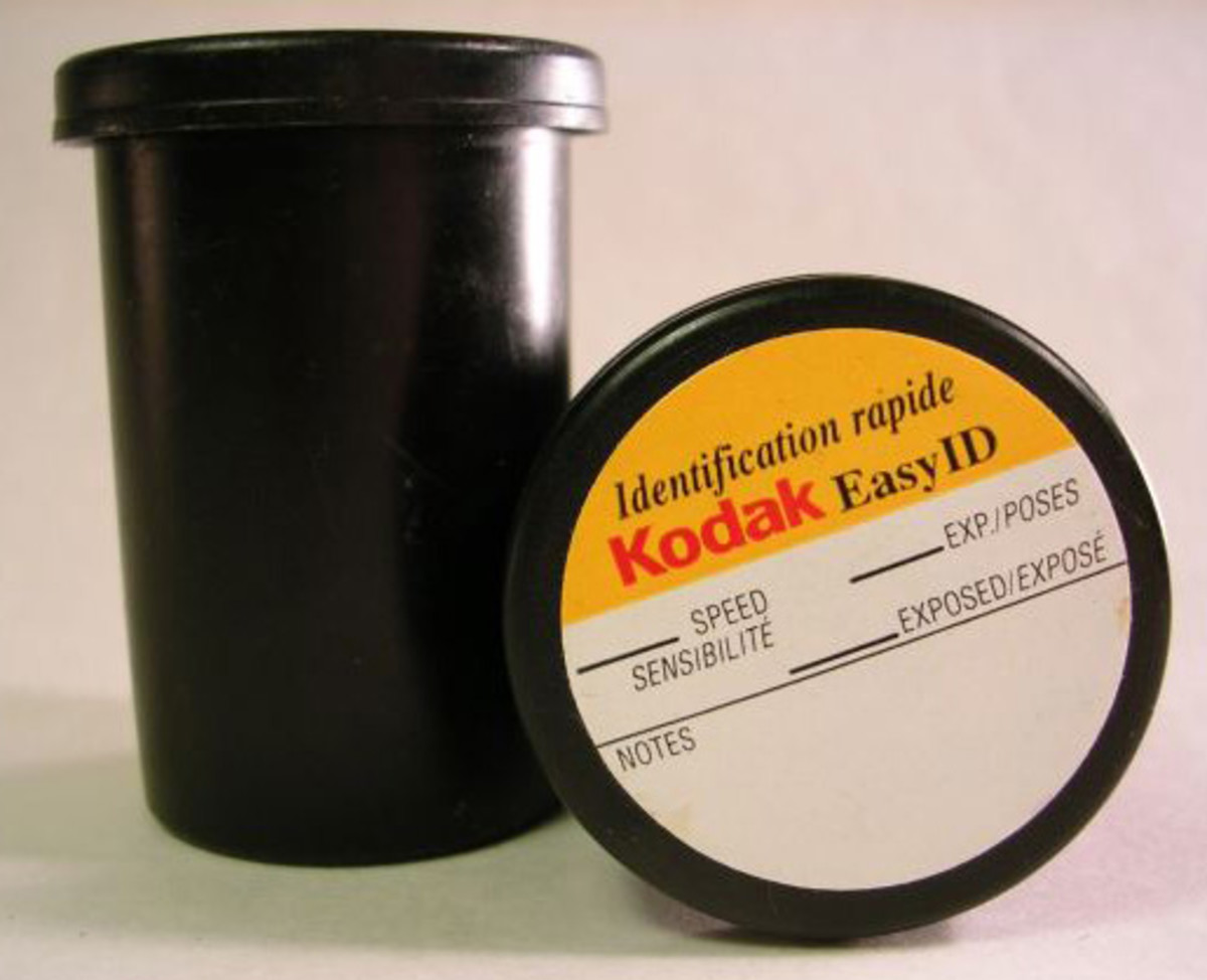 An empty film canister makes an airtight metal clay storage container
