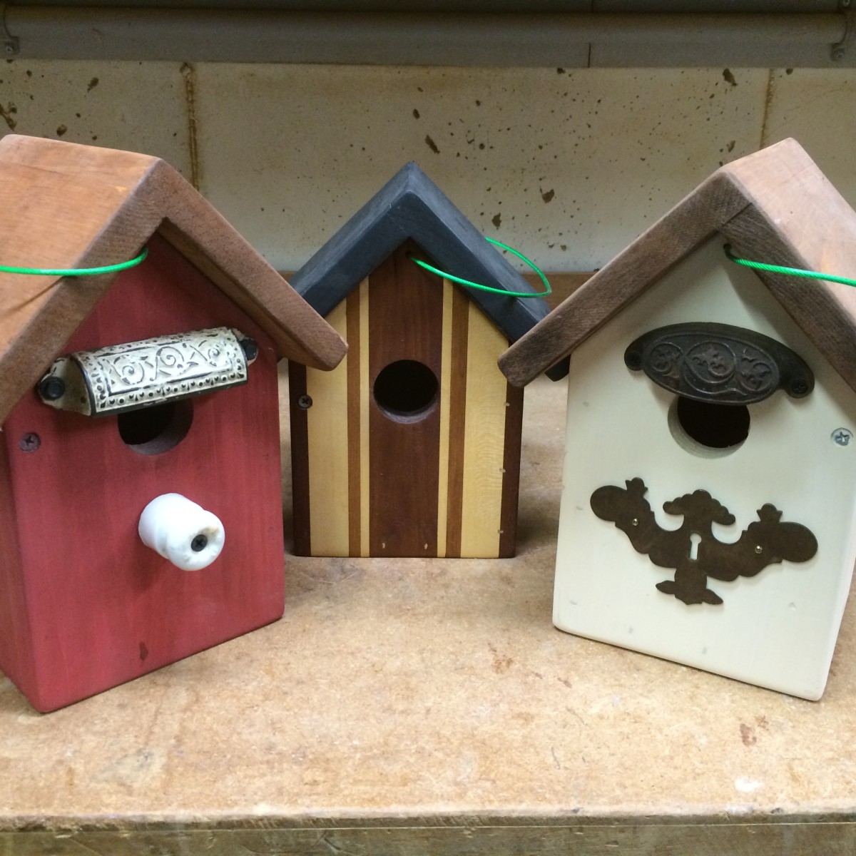 Variations on a theme: these hanging birdhouse will attract wrens.