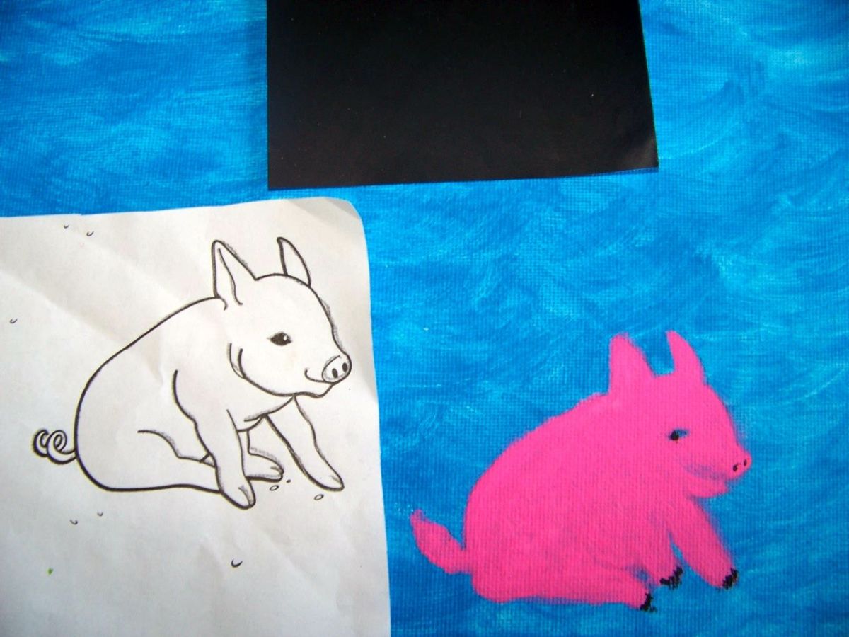 This hot pink pig was painted by four-year-old Aaliyah using the carbon paper tracing method.