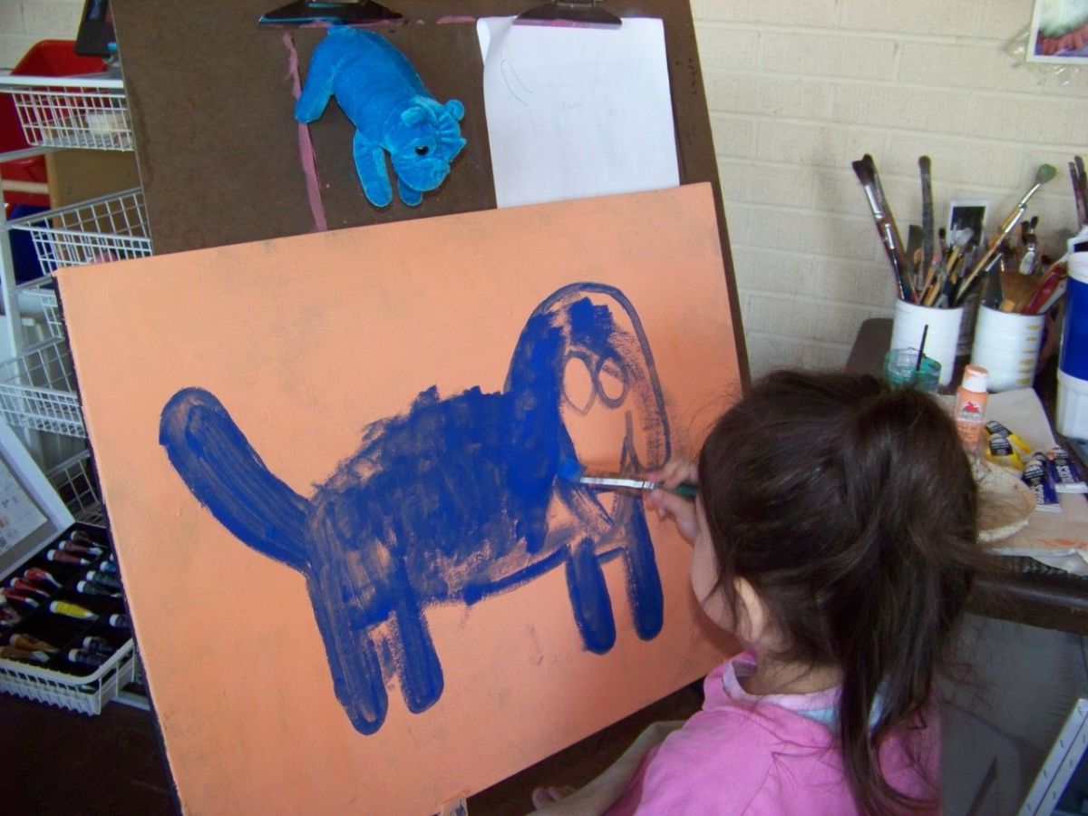 You will see in the end this giant blue dog turned out to be anatomically correct quite by accident. Notice the little blue dog hanging above the painting for inspiration.