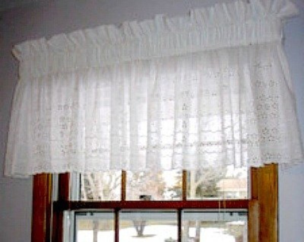 This lacy topper requires a large rod pocket.