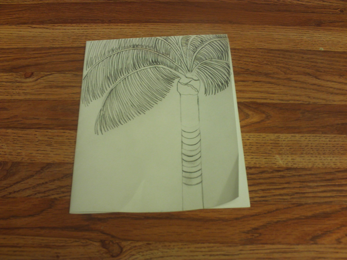 I drew a palm tree on the front of the handmade card.