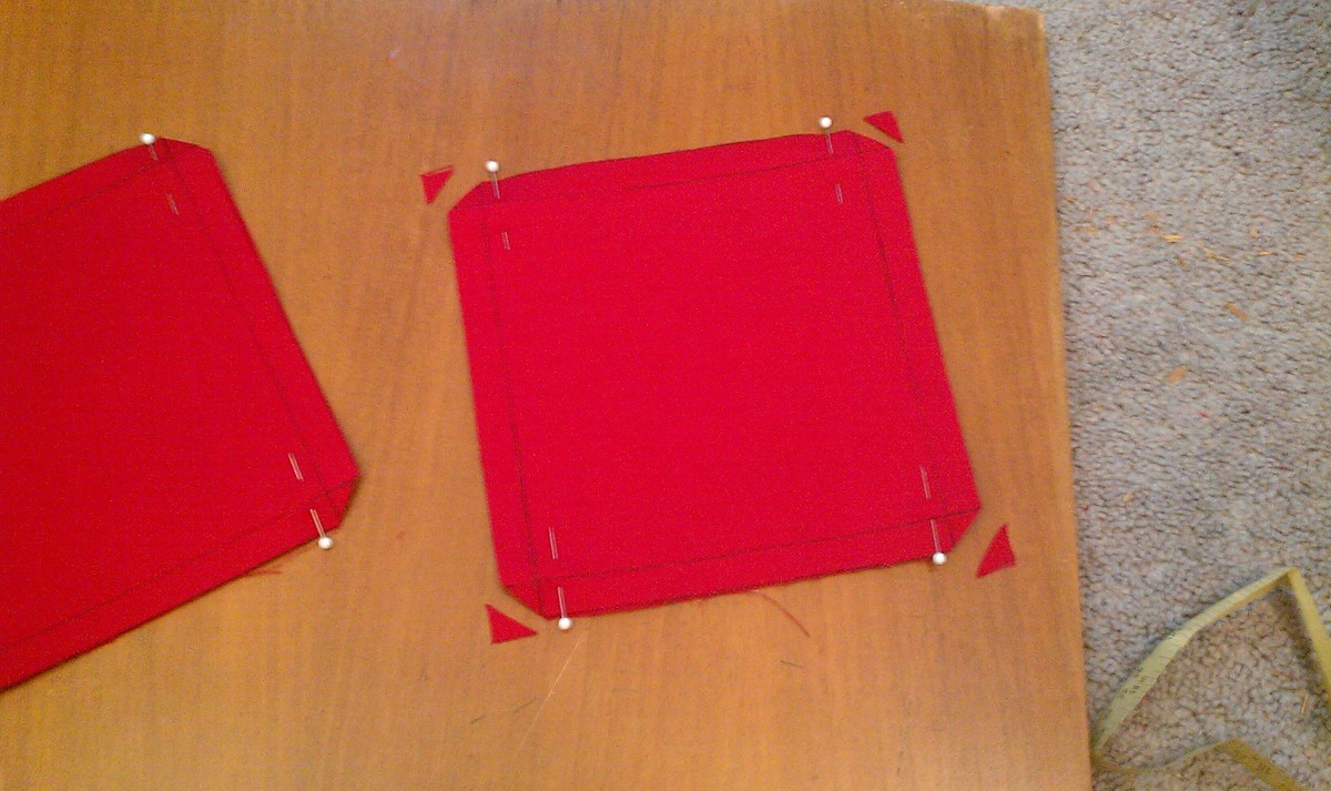 Two pieces stitched together; excess material on corners can be cut off. 