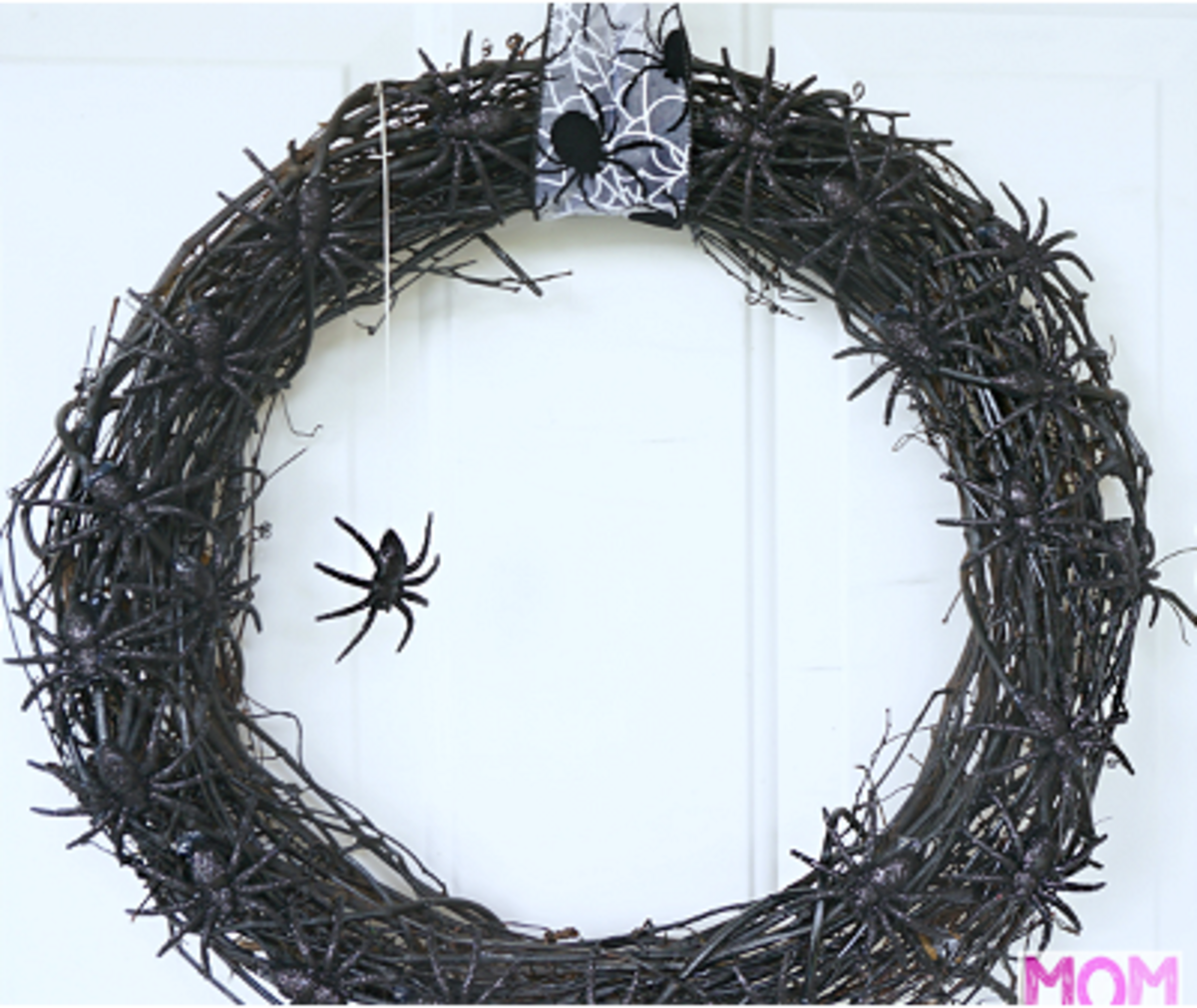 Here's another take on a spooky wreath. This one is covered with spiders.