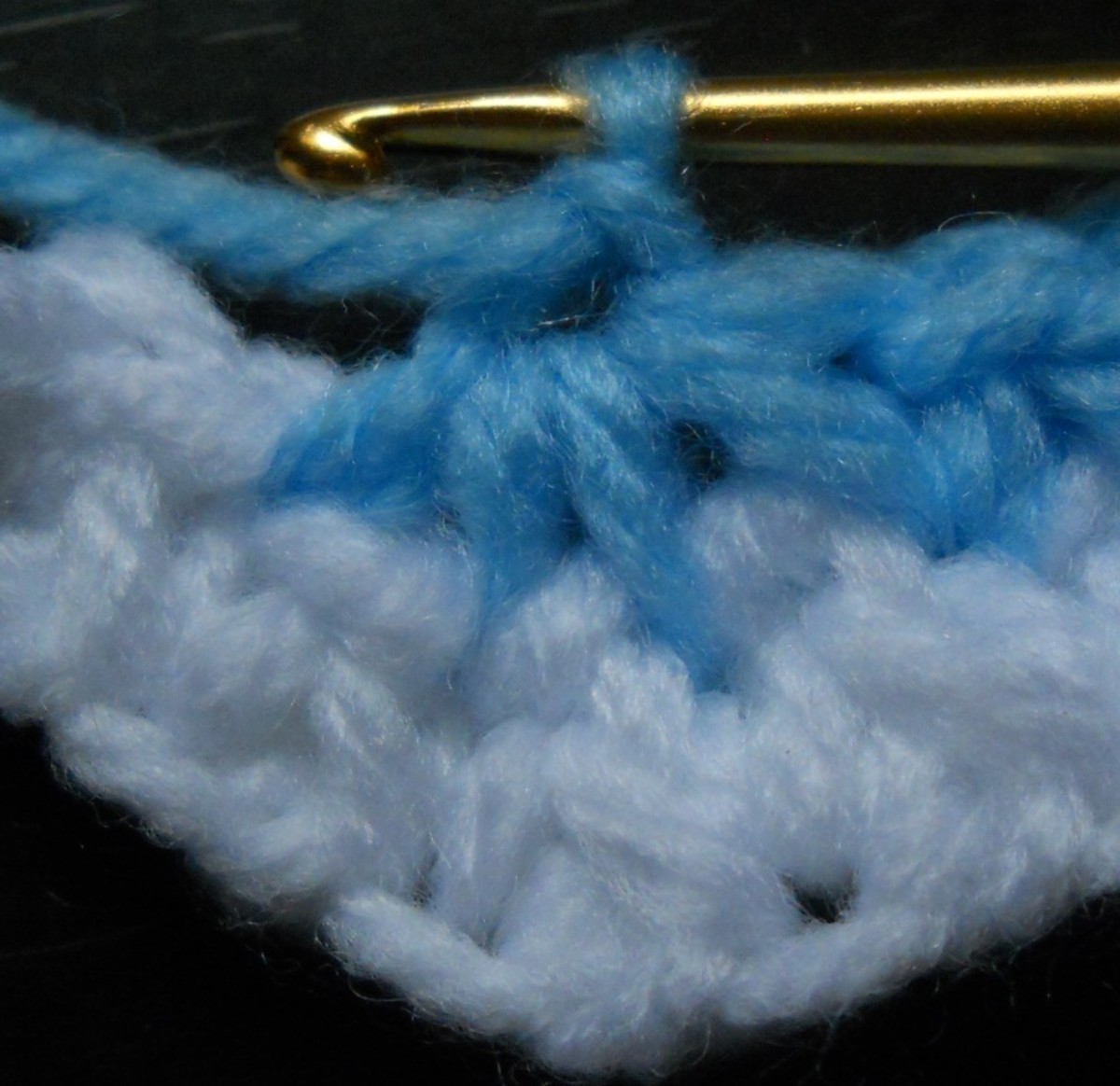 Y o, draw through all 5 loops on hook, ch 1. Y o, draw through all 5 loops on hook, ch 1.
