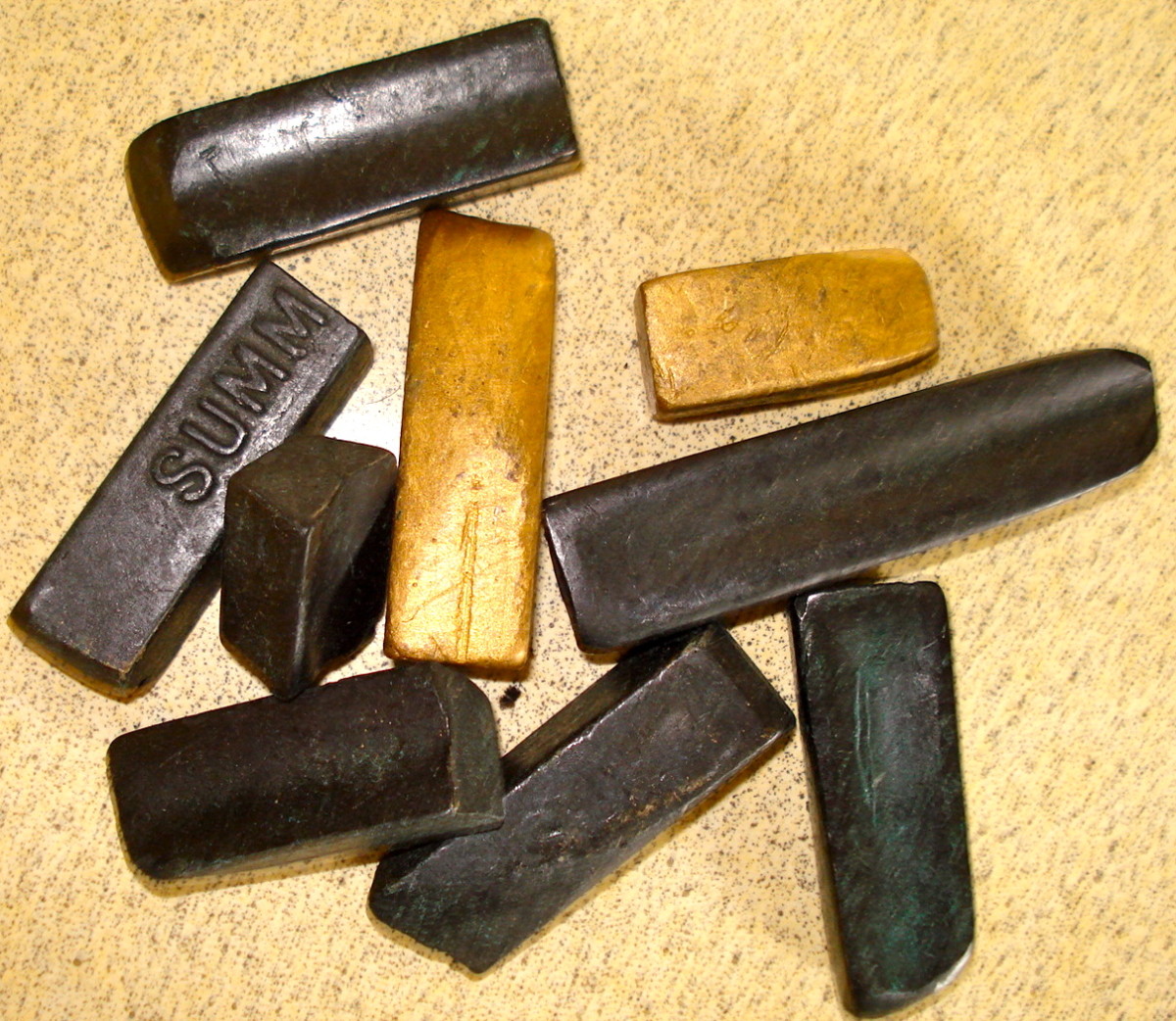 Black and gold wax crayons