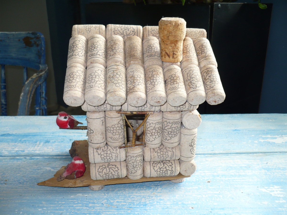 Side view of the cork birdhouse showing the roof and chimney.