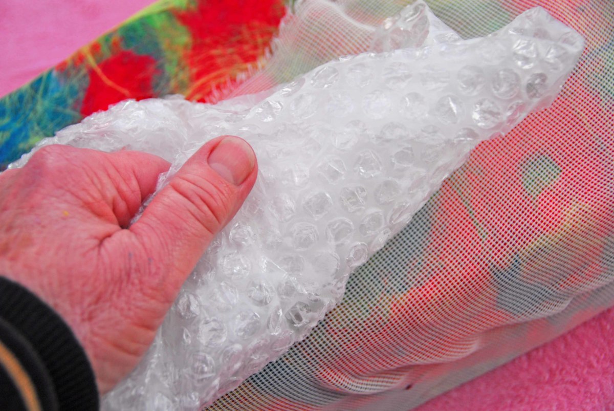 Rub the outside and inside with bubblewrap until the vase is completely felted.