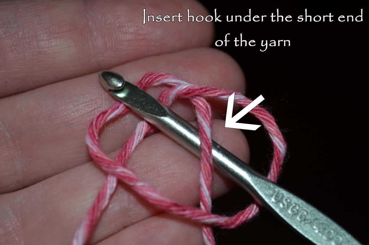 Insert the hook under the short strand.