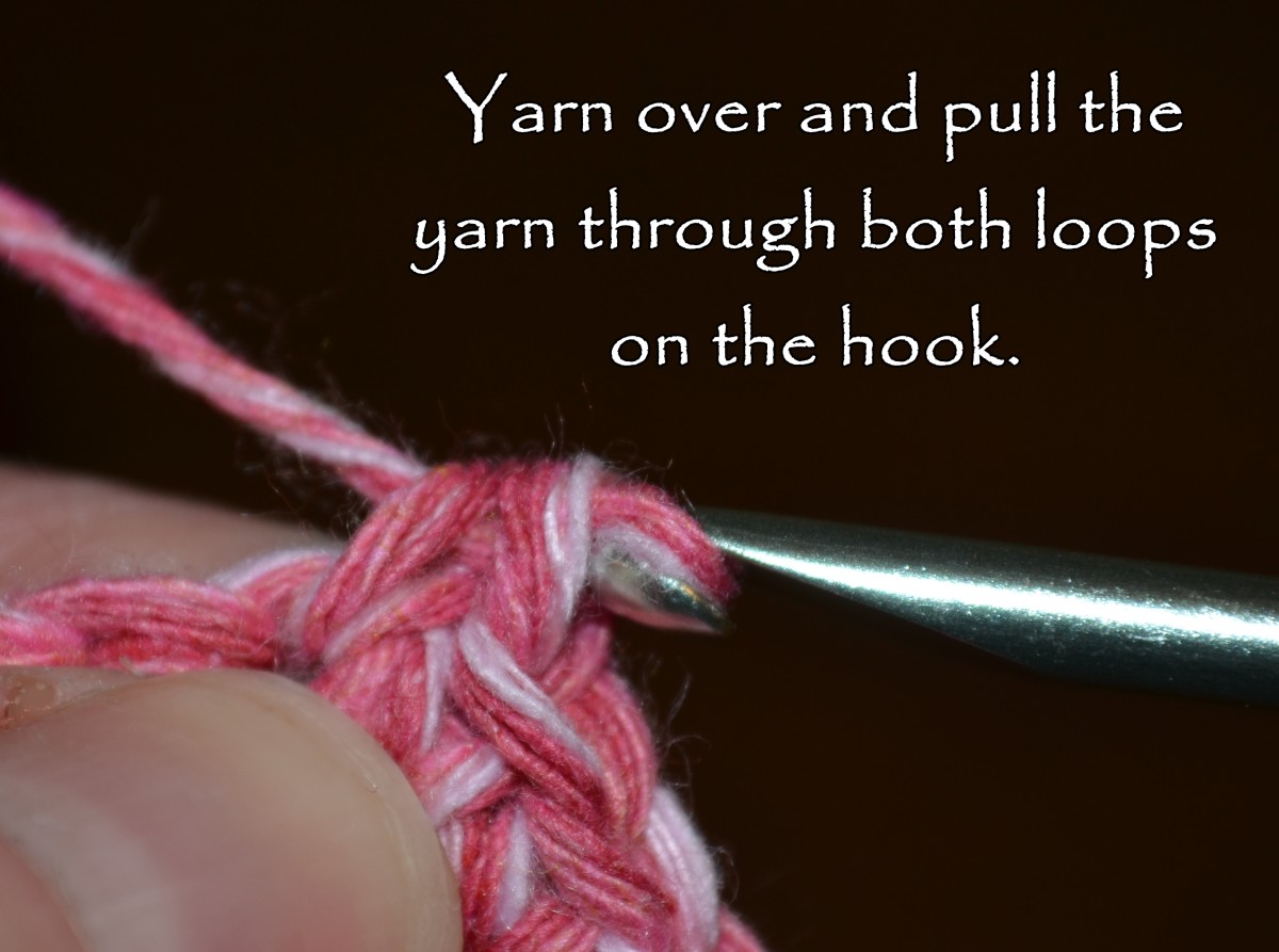 Yarn over and pull the yarn through both loops on the hook. 