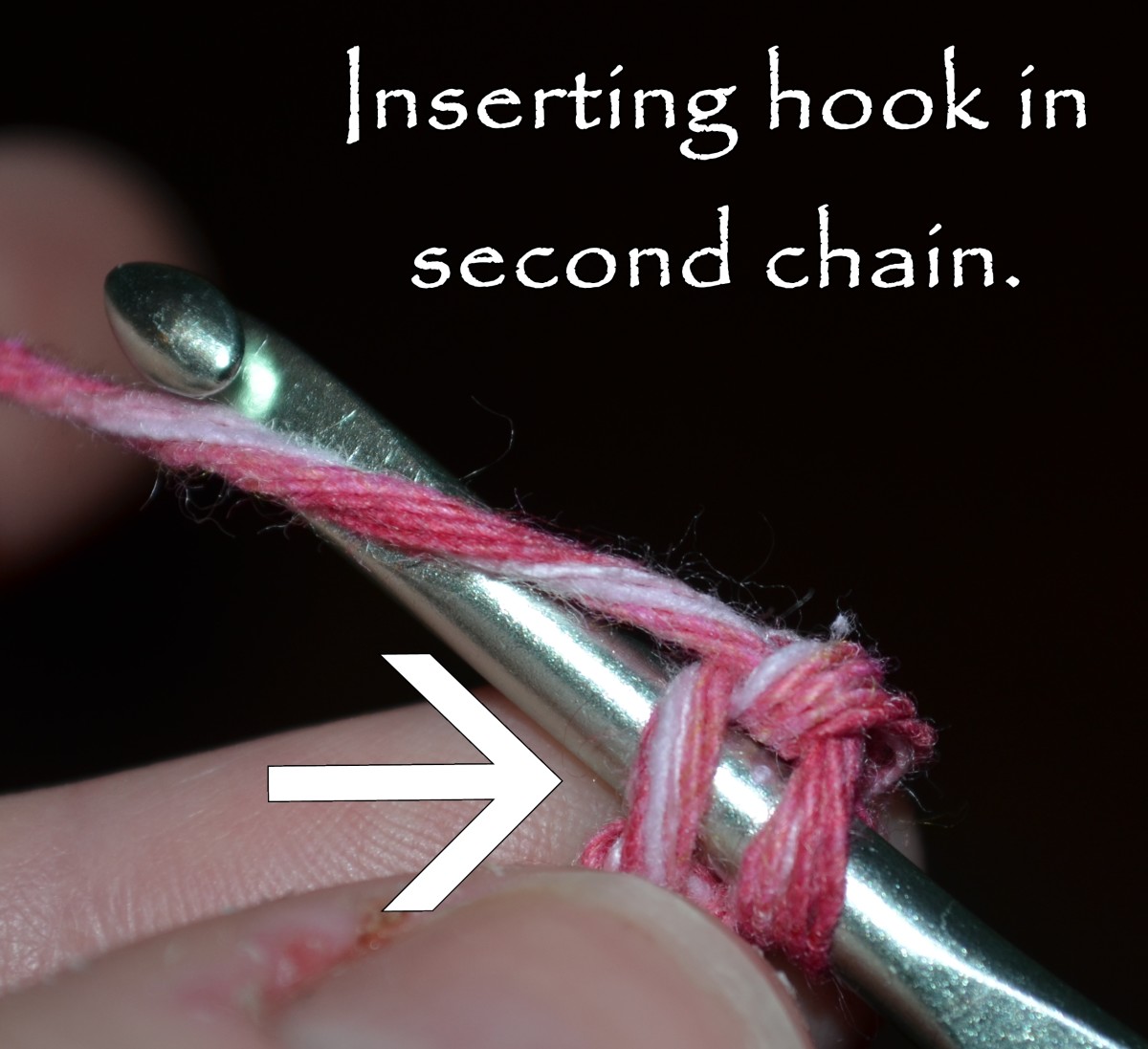 Another angle of inserting the hook in the second chain.
