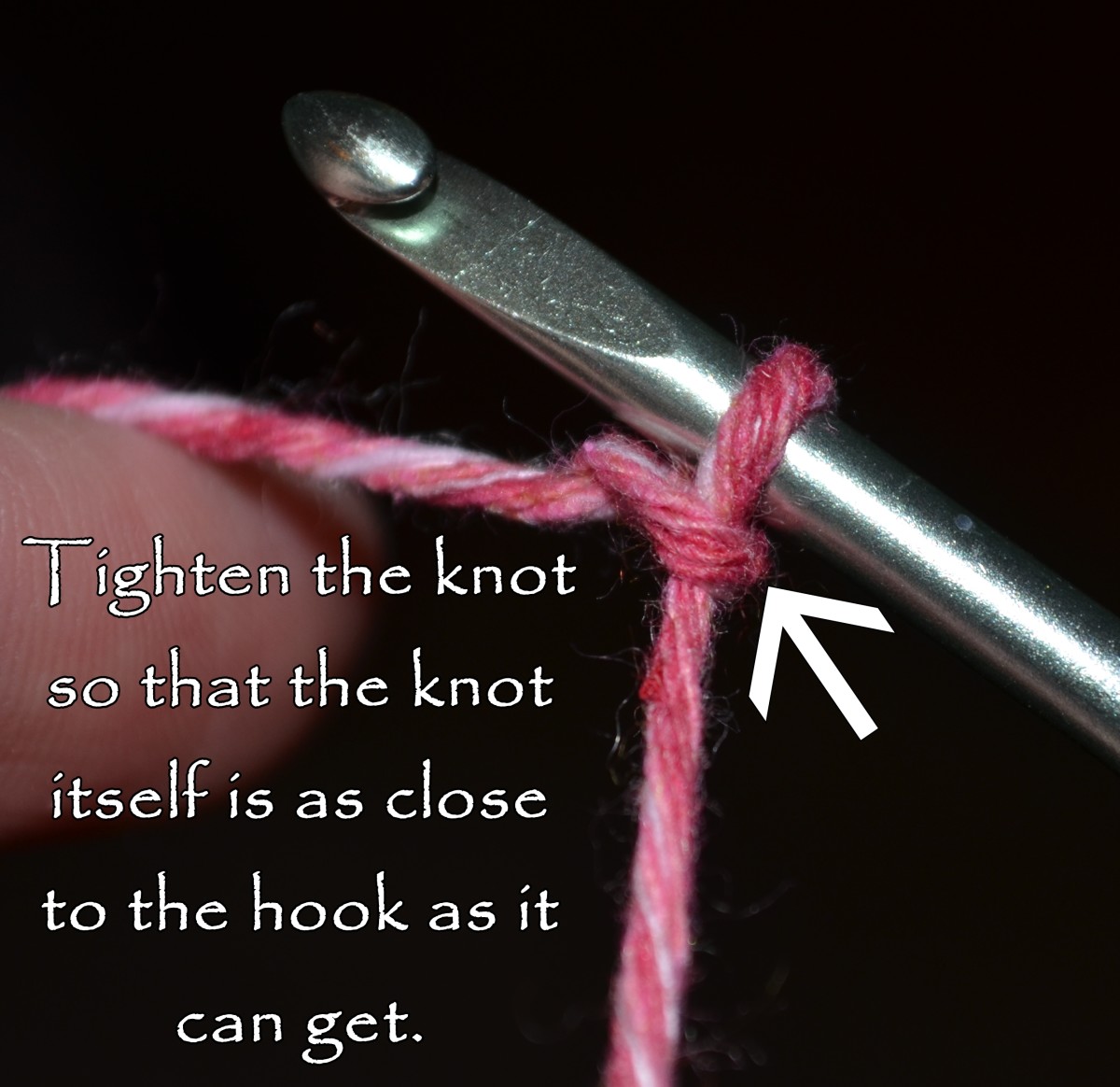 Pull the slip knot tight so that it is asx close to the hook as it can get. 