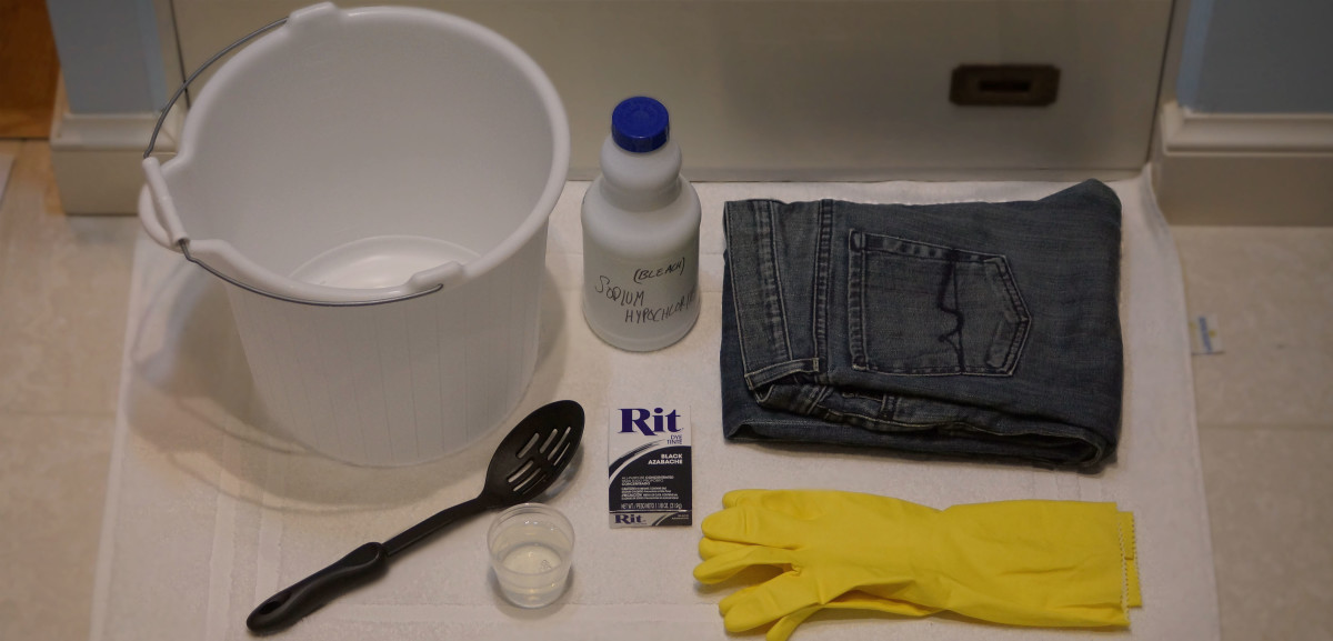 You can dye your jeans in a bucket or sink with Rit dye.