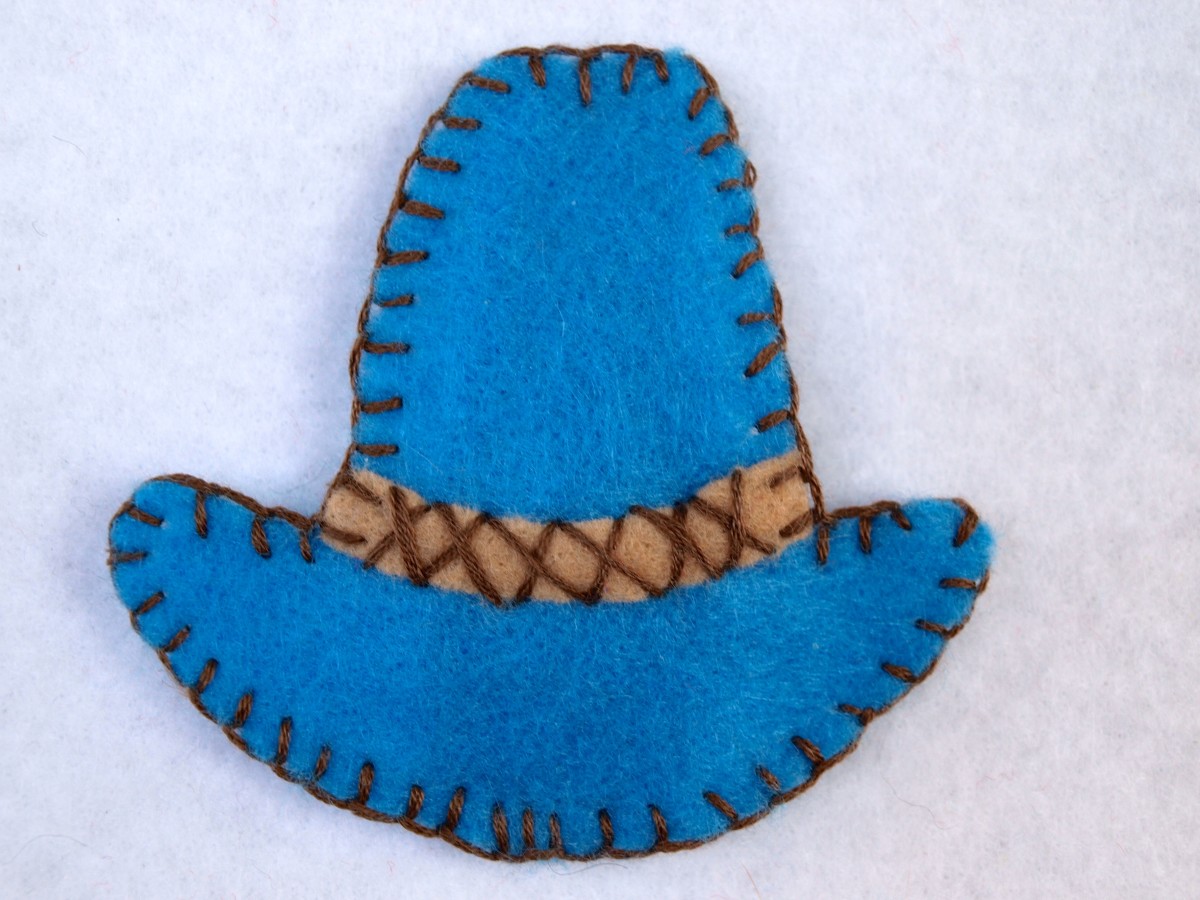 Howdy partner! How cute is this cowboy hat hair clip?