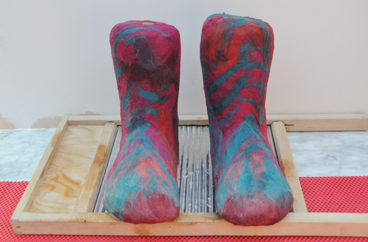 Foot has been completely covered in wool fibers