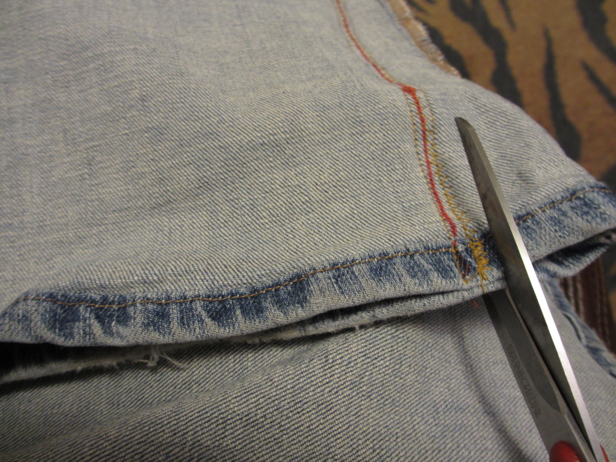 Cut your jeans along the new seam.
