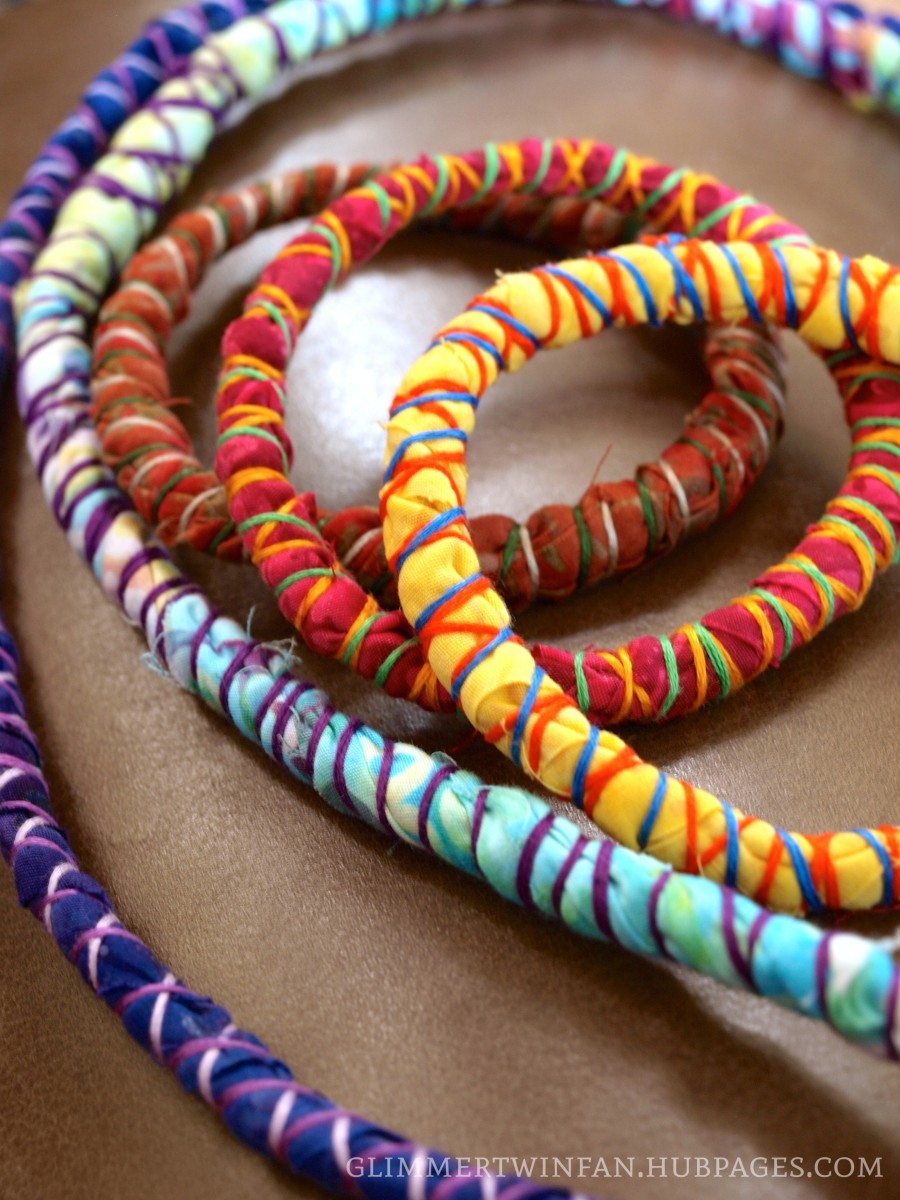 Wear them separately or all together for a fun and funky look. These fabric-wrapped cord bracelets and necklaces jazz up any outfit!