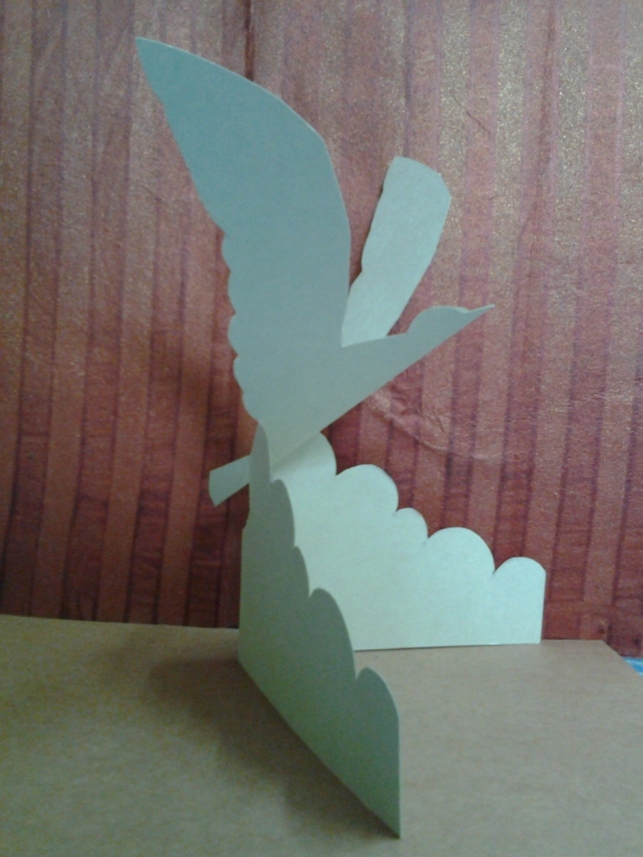 Learn how to make this pop-up bird card.