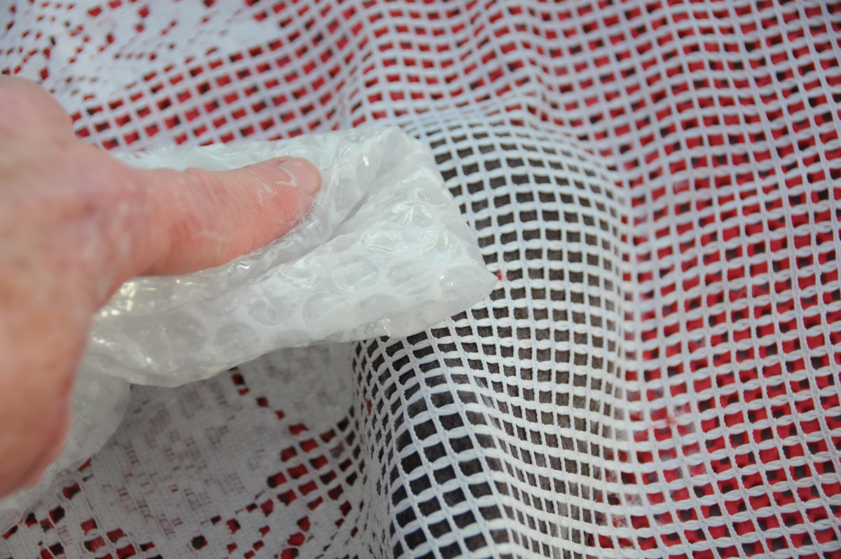 Rub firmly with bubble wrap until the fibers begin to knit together
