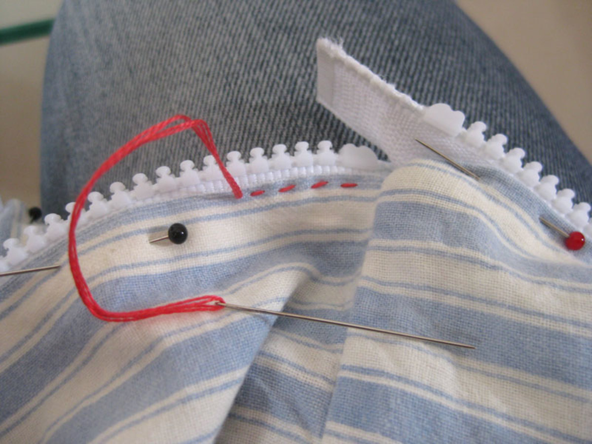 Start sewing at the top of the zip end, letting the end bits hang free.