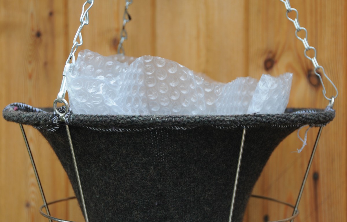 Insert the bubble-wrap liner into the woolen liner