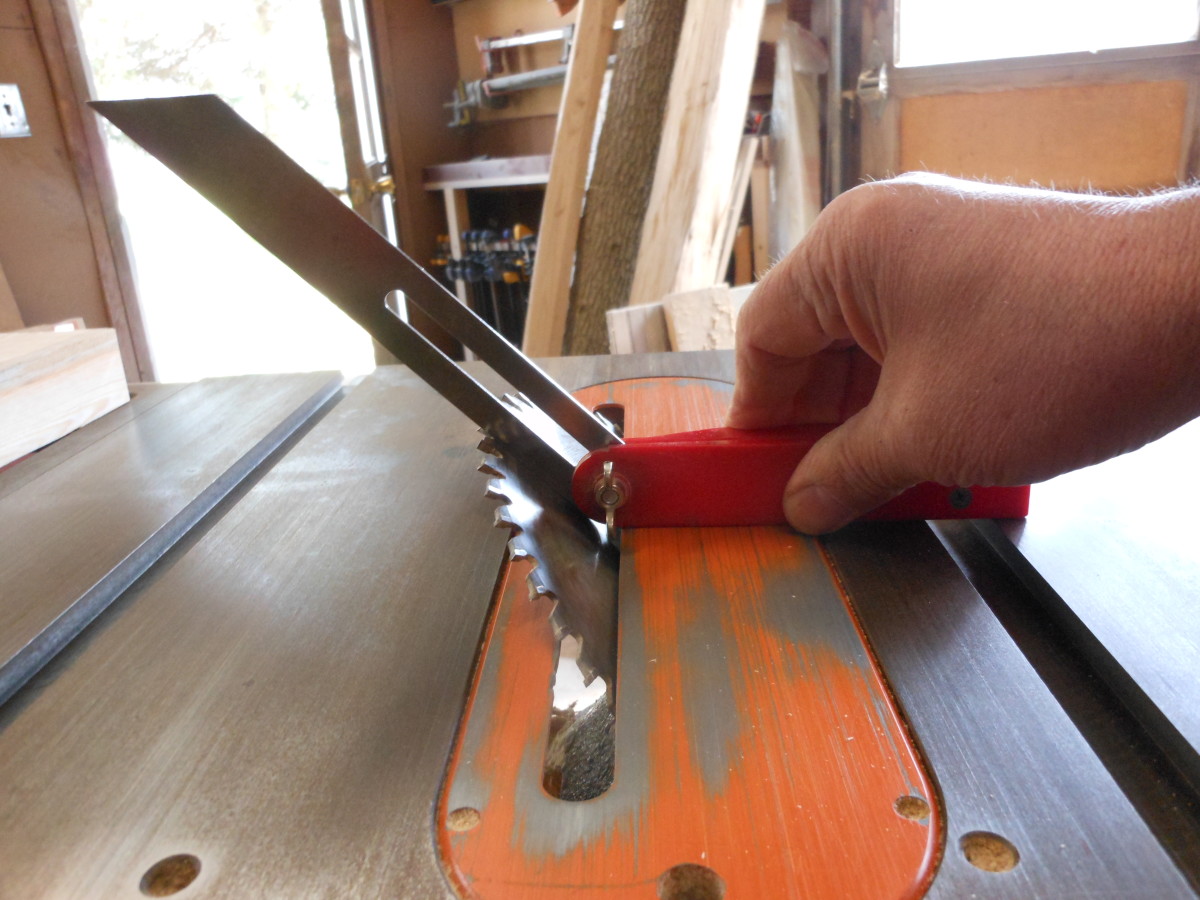 Setting up the table saw blade at 45 degrees to cut the chamfers.
