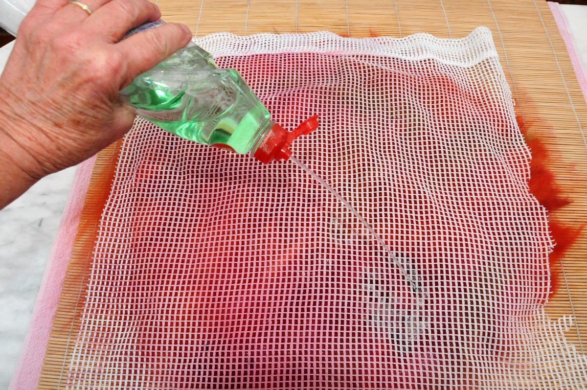Cover the fibers with soapy water.