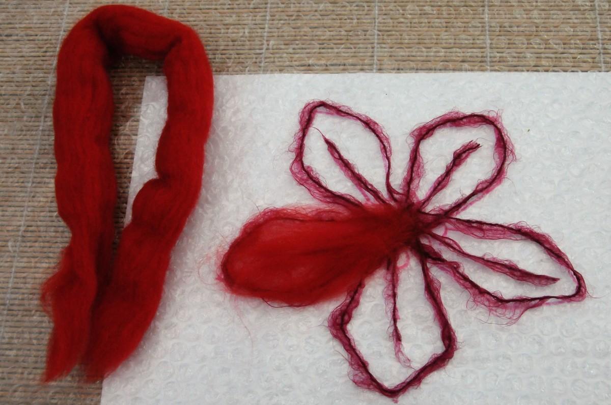 Lightly fill the petals with a fine even layer of Merino wool roving.