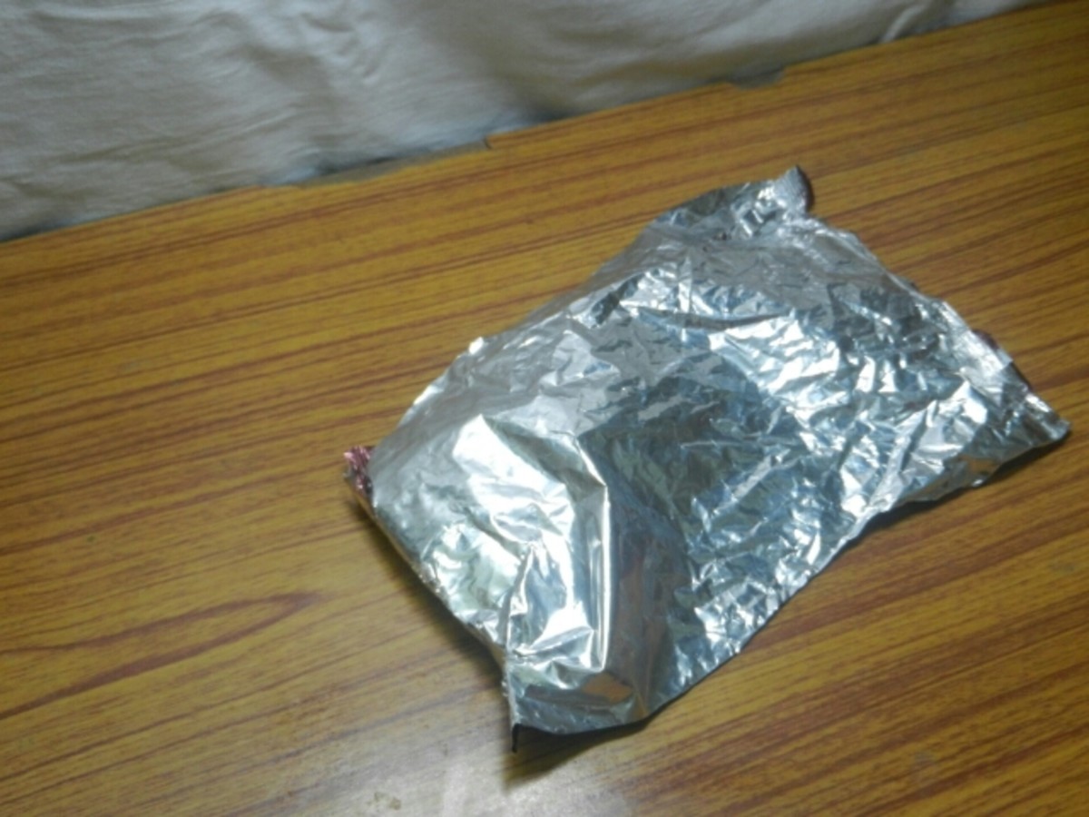 To make similar roof for your house you have to use a plastic wrapper which has a shiny side. I used a plastic wrapper of a biscuit.