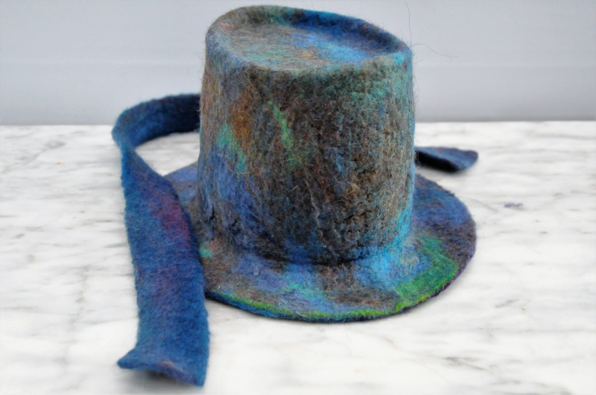 The hat with the excess felt made into a hat band