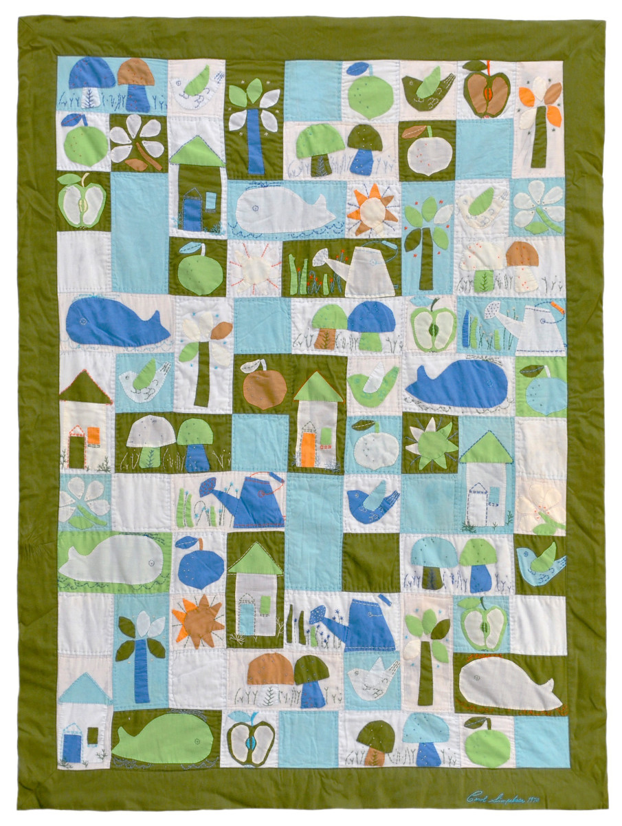 Here is a lovely, colorful quilt showing fish, apples, birds, watering cans, and more.