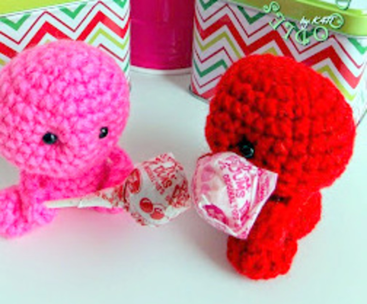 If you're giving your sweetie some candy this year, why not have a crochet creature deliver it?