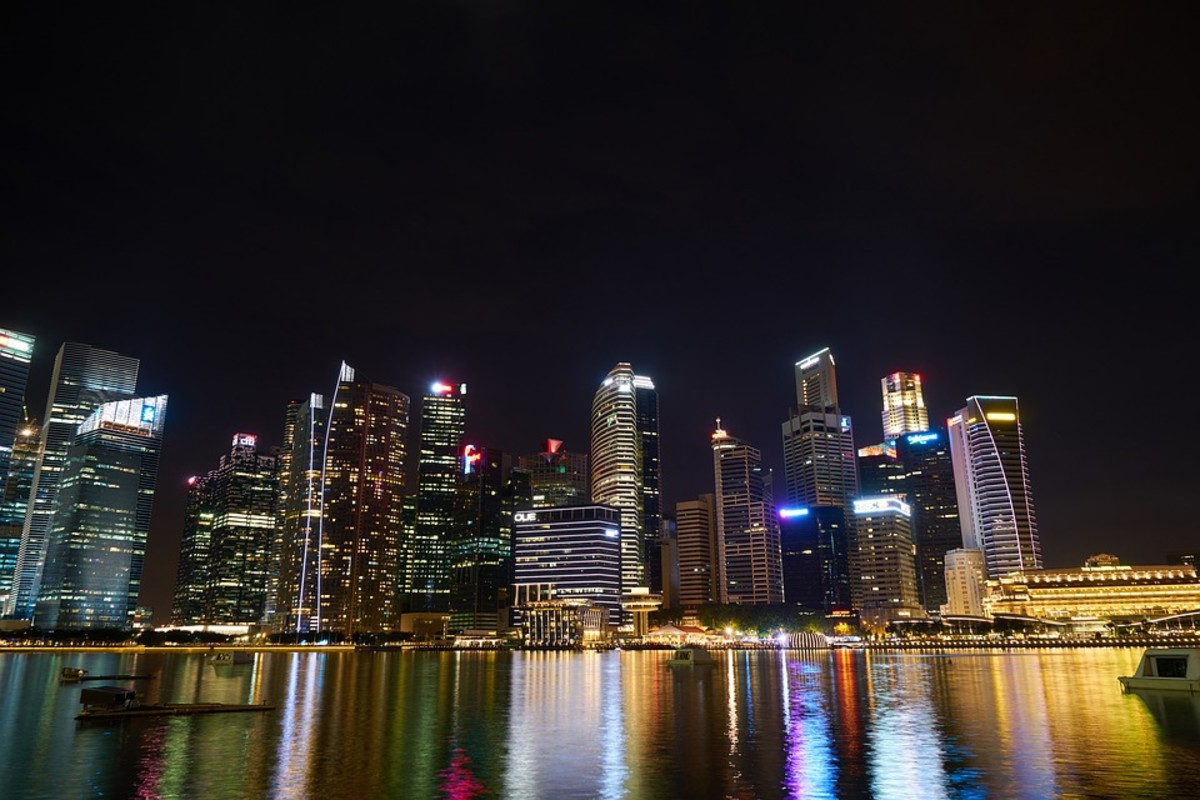 Singapore at night along the water. Great use of lights and reflections.