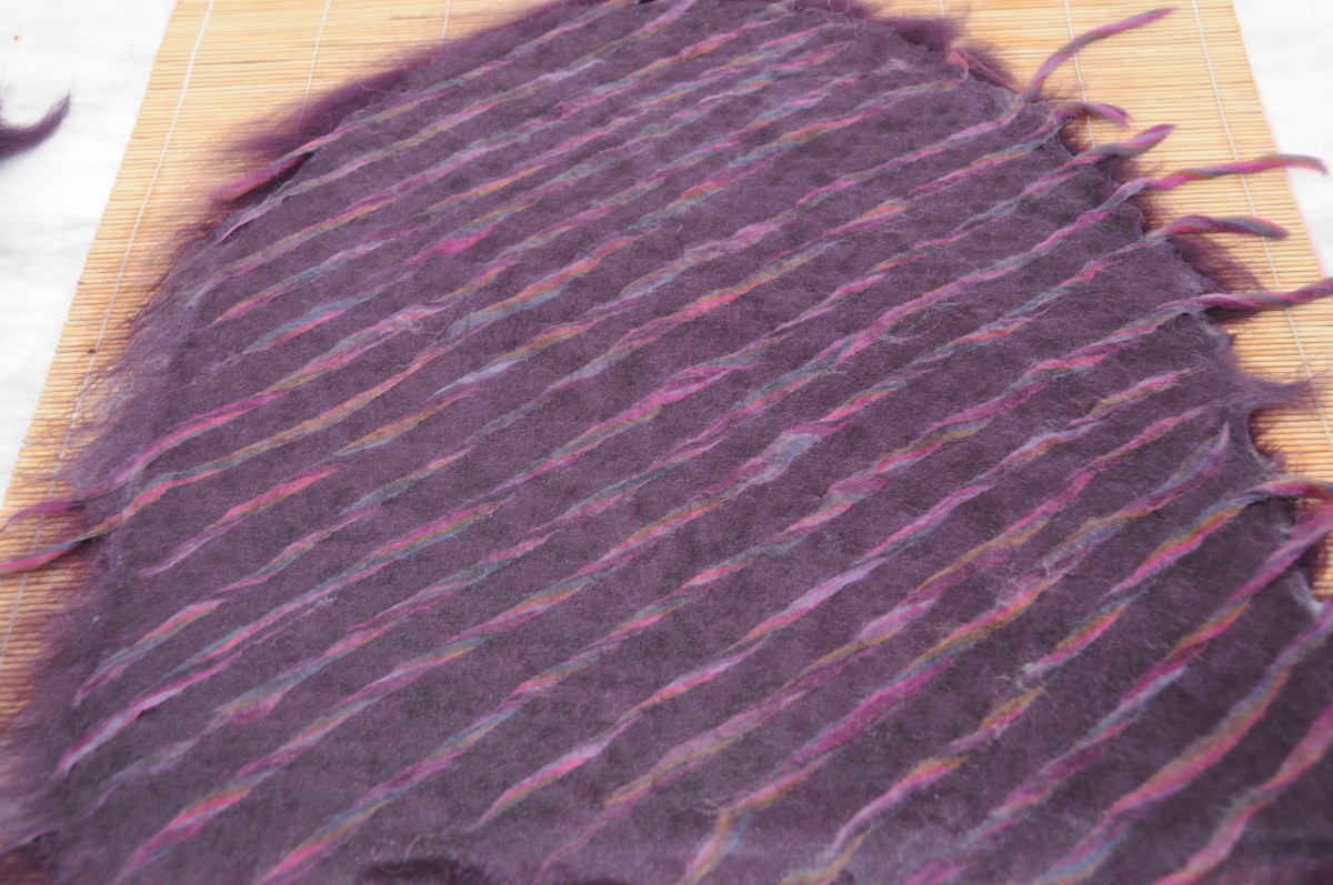 The wet wool showing the embellishment.