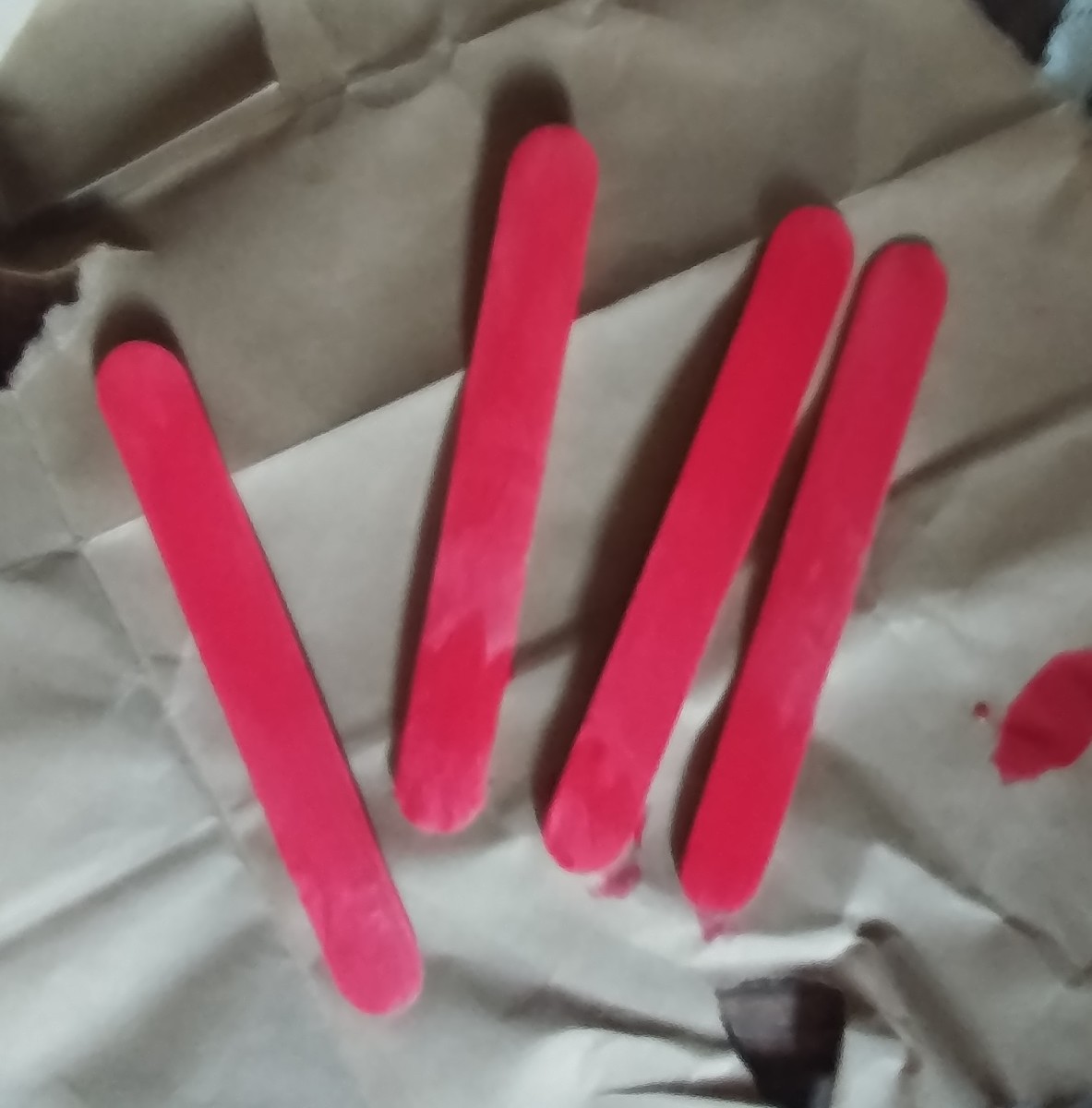 Paint lollipop sticks.