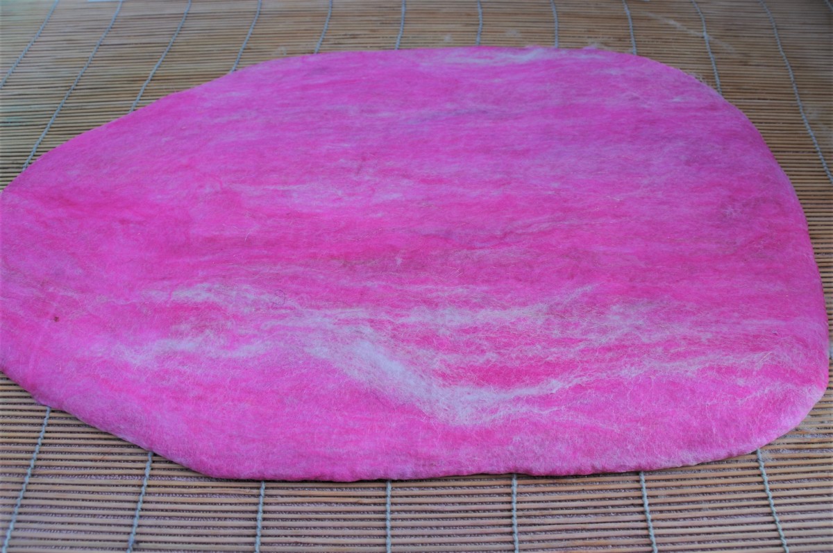 3 layers of Merino wool fibers have now added to both sides of the template.