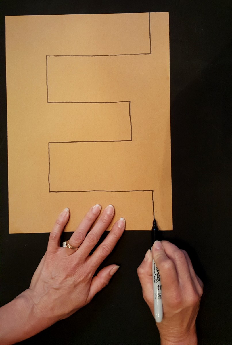 Draw out the letter “E”
