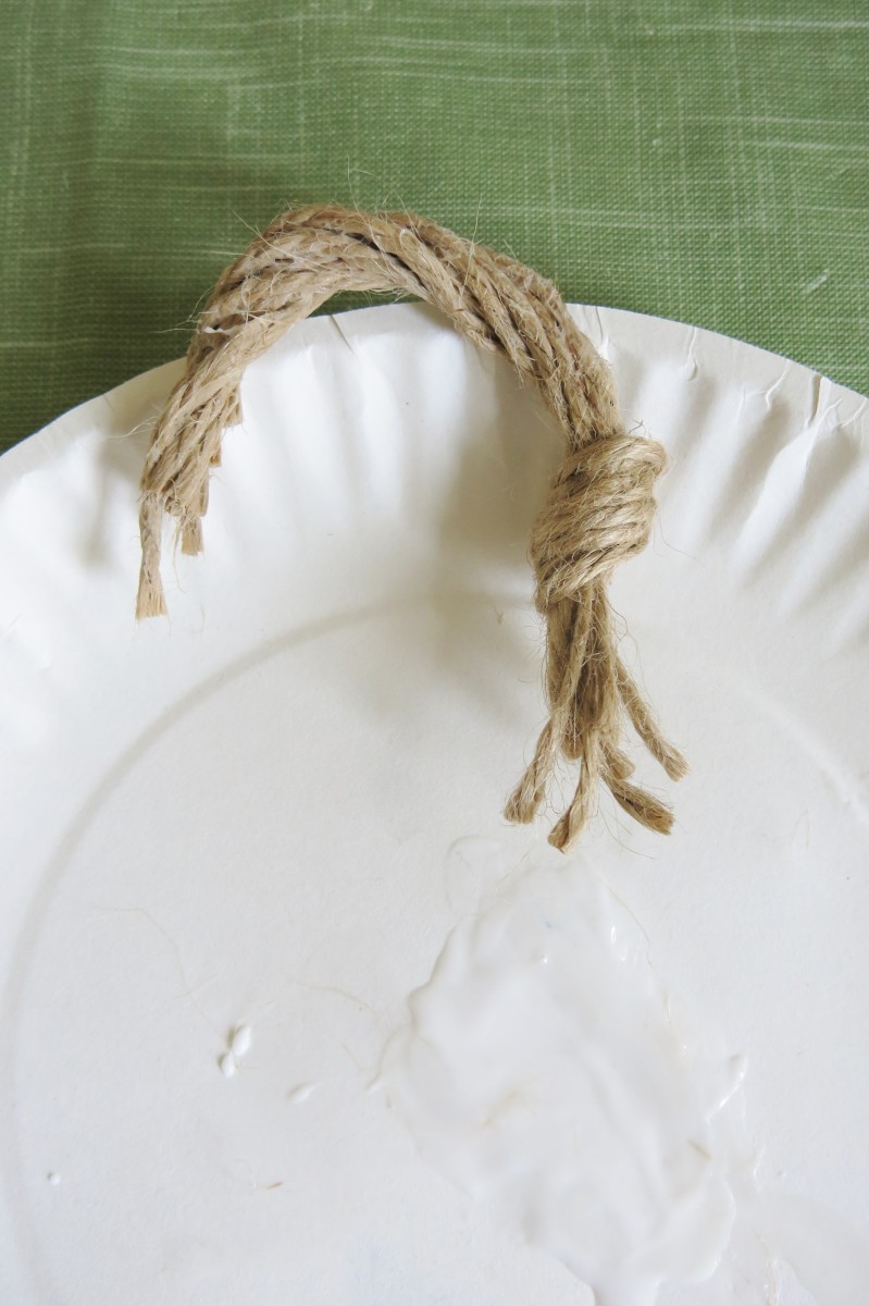 Coat the twine stem with a clear-drying white glue.