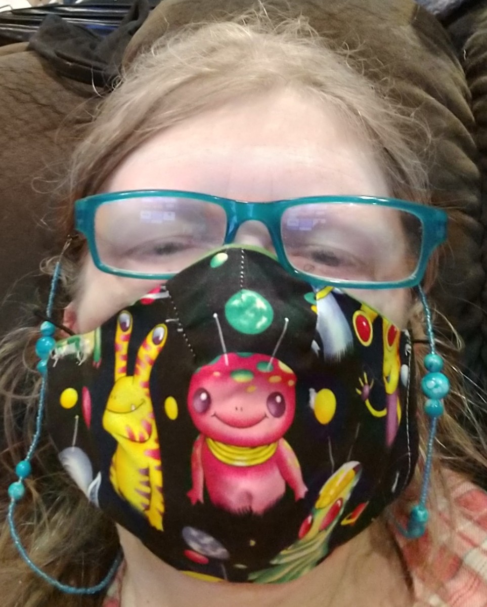 This fabric made me laugh, so I made myself a mask from it. I moved the pattern around until I liked the position before cutting it.