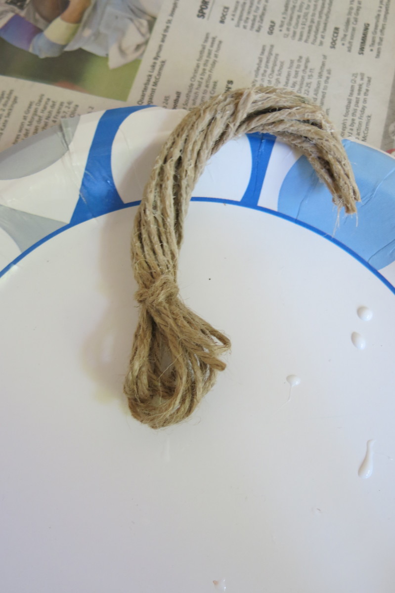 Twist your coated twine or yarn into the shape for your stem.