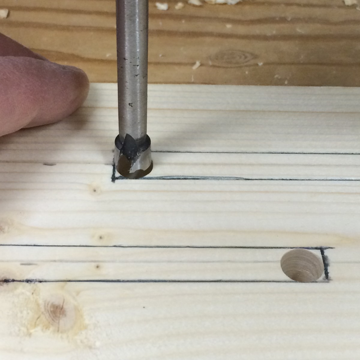 Drill holes at the end of the slots