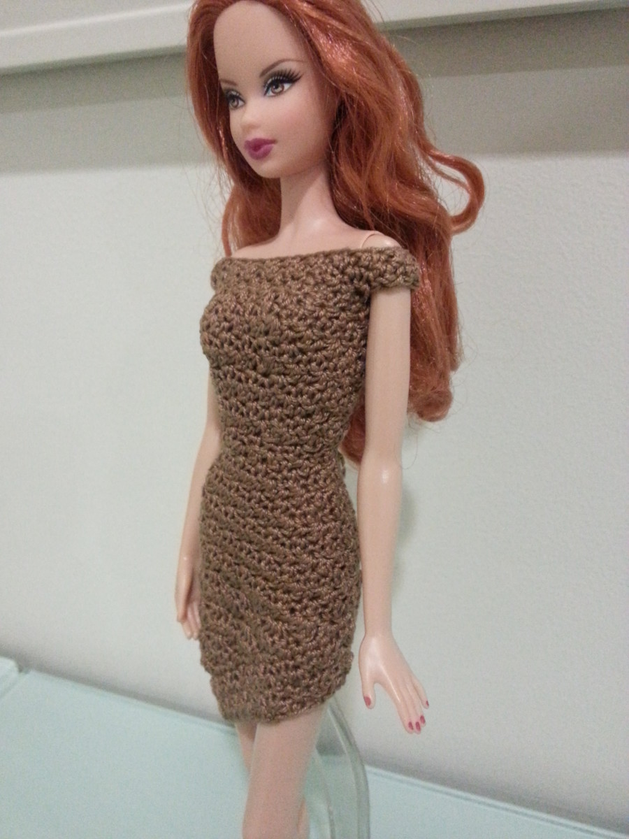 Side view of Barbie asymmetrical off-shoulder dress