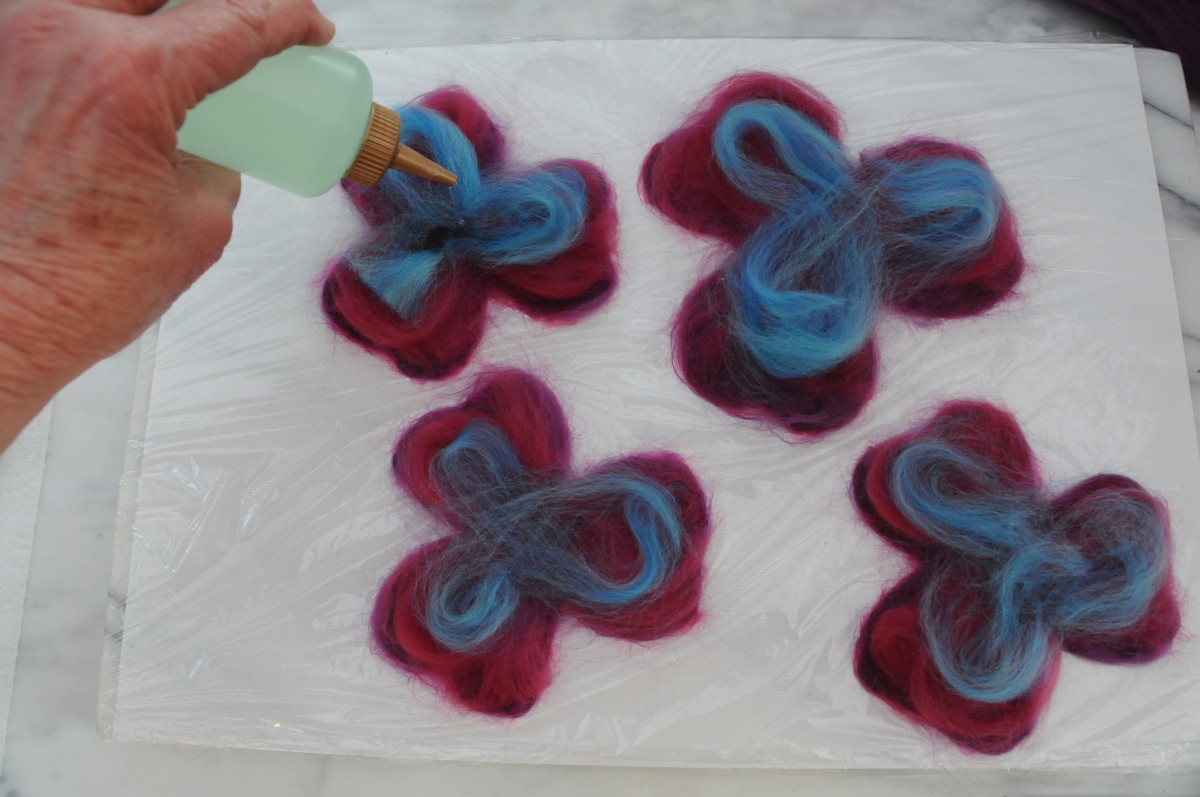 Wetting the fibers with warm soapy water
